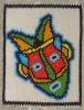 Kwanzaa Mask: 78 x 102 mm and   just under 8,000  beads