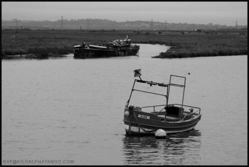 Ajax: Two boats, one of which is called Ajax, in the water near the bridge to Benfleet from Canvey Island.
