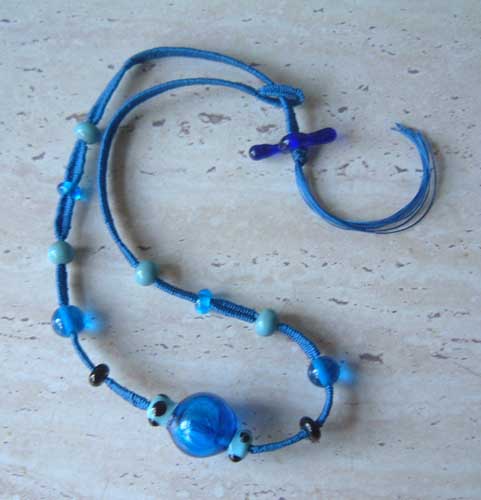 Blue beaded treasure necklace